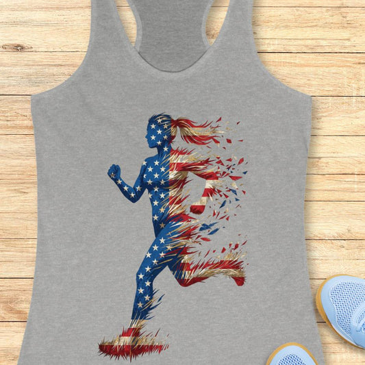 Gray tank top with a colorful graphic of a running woman with American flag theme on a wooden surface