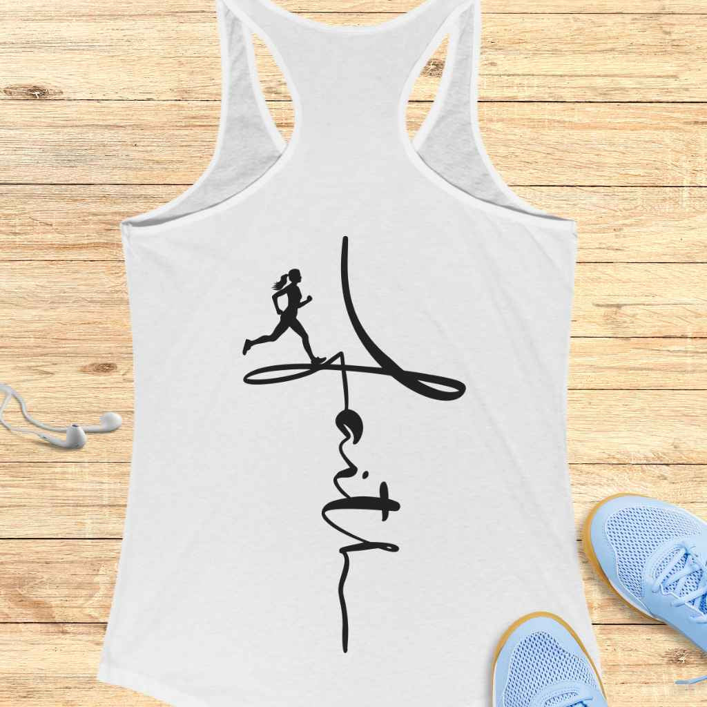 White tank top with black graphic design on a wooden surface with sneakers and earbuds.