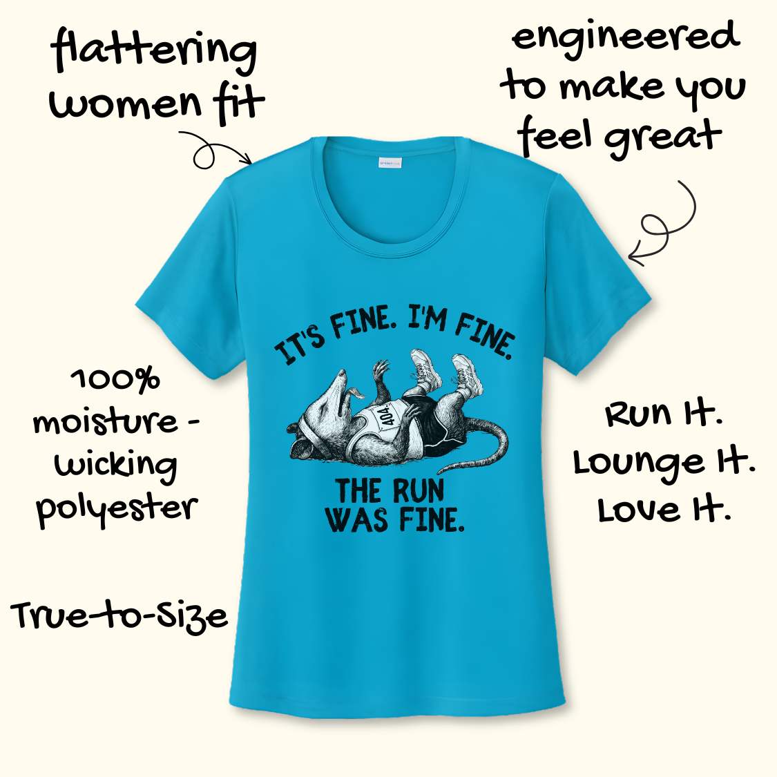blue performance t-shirt with possum image and text 'It's fine. I'm fine. The run was fine.' on a wooden surface with sneakers.