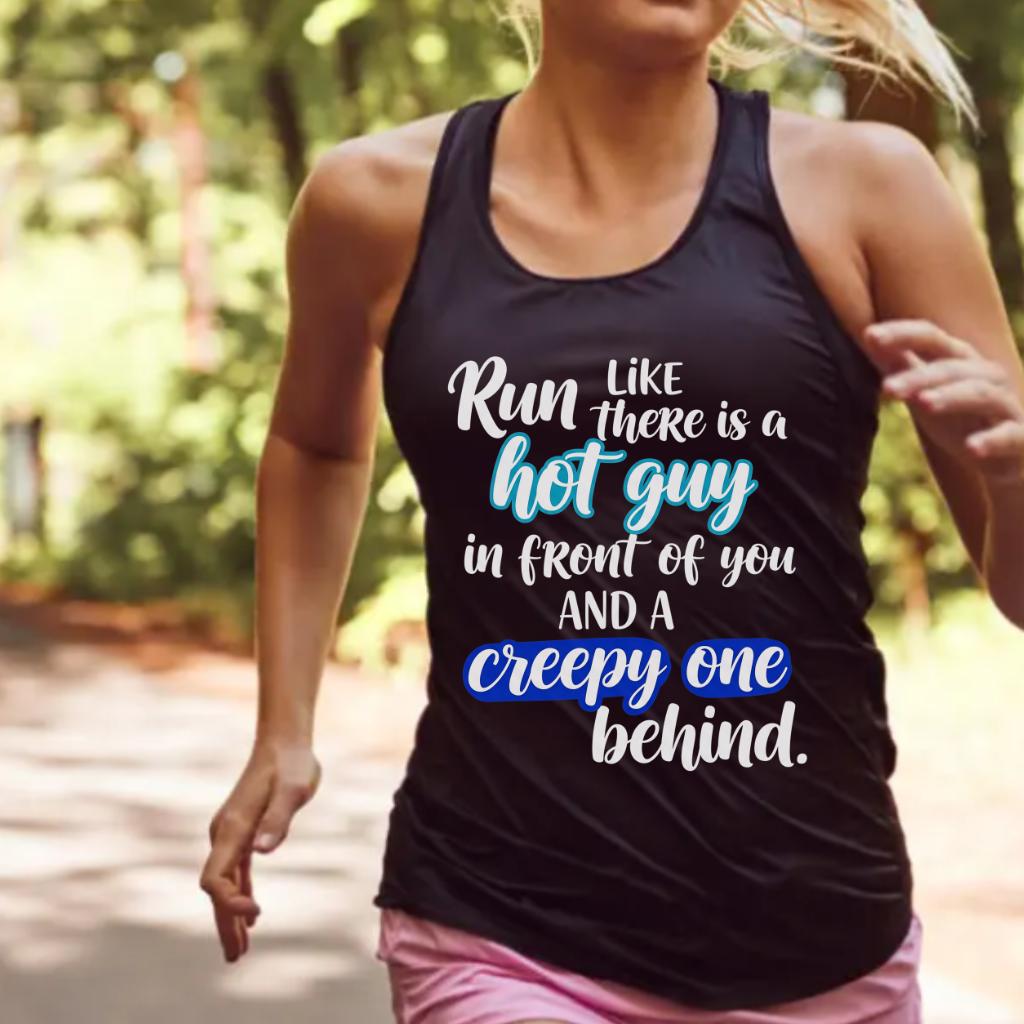 A women's running tank top featuring the humorous slogan "Run like there is a hot guy in front of you and a creepy one behind." This shirt is from our Unleashed Threads collection, designed for female runners.
