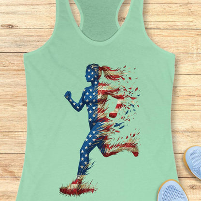 mint tank top with a colorful graphic of a running woman with American flag theme on a wooden surface