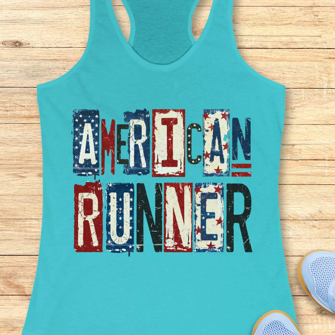 Turquoise tank top with 'American Runner' text on a wooden surface