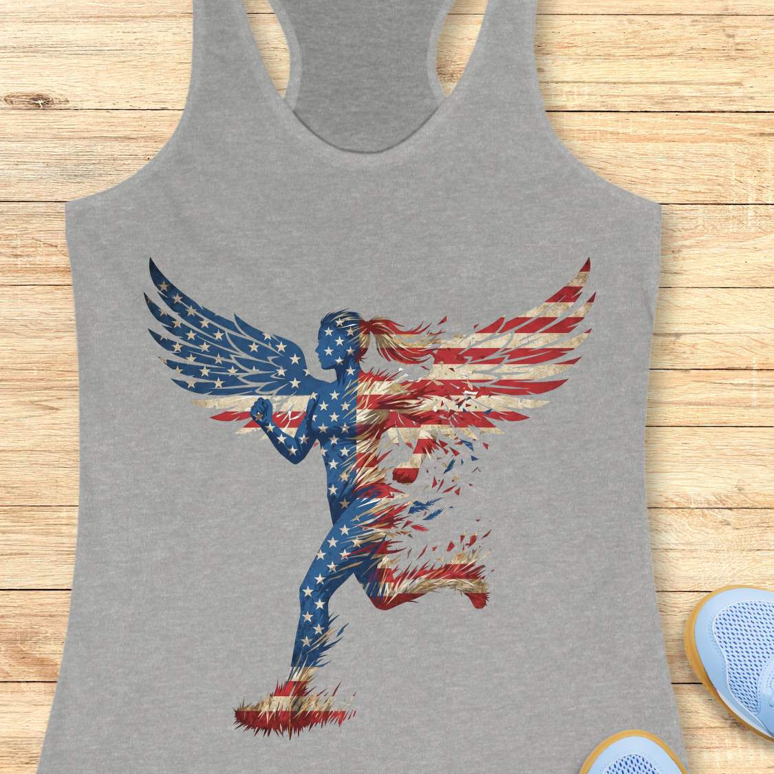 Gray tank top with American flag design on a wooden surface