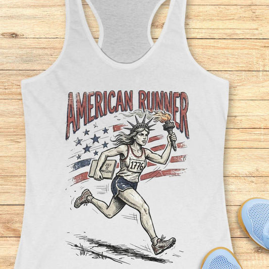 white tank top with a design of lady liberty running and text - 'American runner, on a wooden surface.
