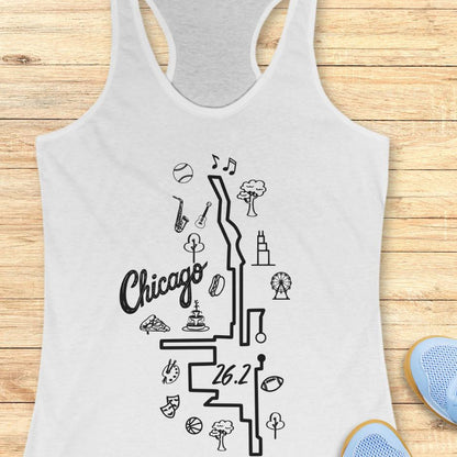 white tank top with a map of the marathon route in Chicago, with the text Chicago and 26.2, on a wooden background