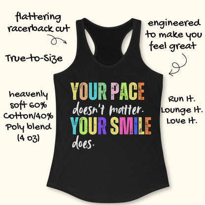 Inspirational women's running tank top featuring the motivational quote "Your Pace Doesn't Matter. Your Smile Does." in colorful distressed retro lettering. Printed on a black racerback tank top, the uplifting design promotes body positivity, running confidence, and enjoying the journey rather than focusing on speed. The vibrant typography includes yellow, blue, green, pink, and orange accents, creating a cheerful and encouraging look. Perfect for women runners, beginner runners, marathon runners, walking e