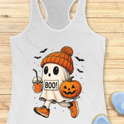 white tank top with Halloween ghost design on a wooden surface