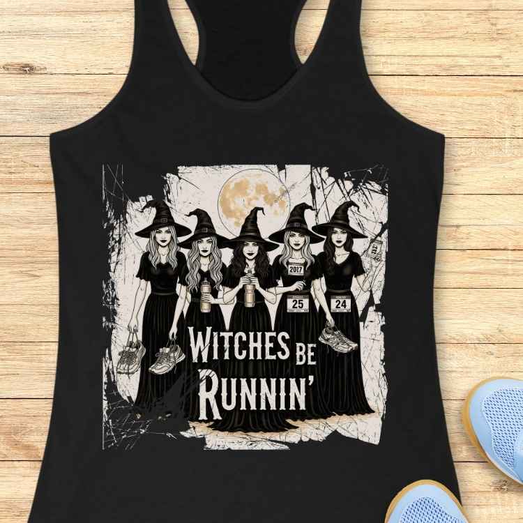 Graphic print on tank top depicting five cartoon witches in black dresses and pointed hats holding running shoes and water bottles, sporting race bibs with numbers 2017, 25, and 24, all set against a full moon and distressed background, with the phrase Witches Be Runnin