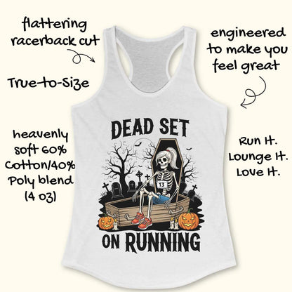 Illustration on a white tank top depicting a female skeleton runner with a ponytail, a number 13 bib, blue shorts, and red sneakers, sitting in an open coffin in a spooky graveyard with bare trees, tombstones, and a full moon, flanked by two glowing jack-o'-lanterns, with the text Dead Set On Running