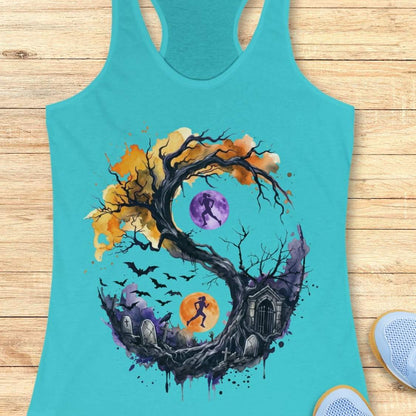 blue tank top with Halloween ying and yang graphic design , on a wooden surface