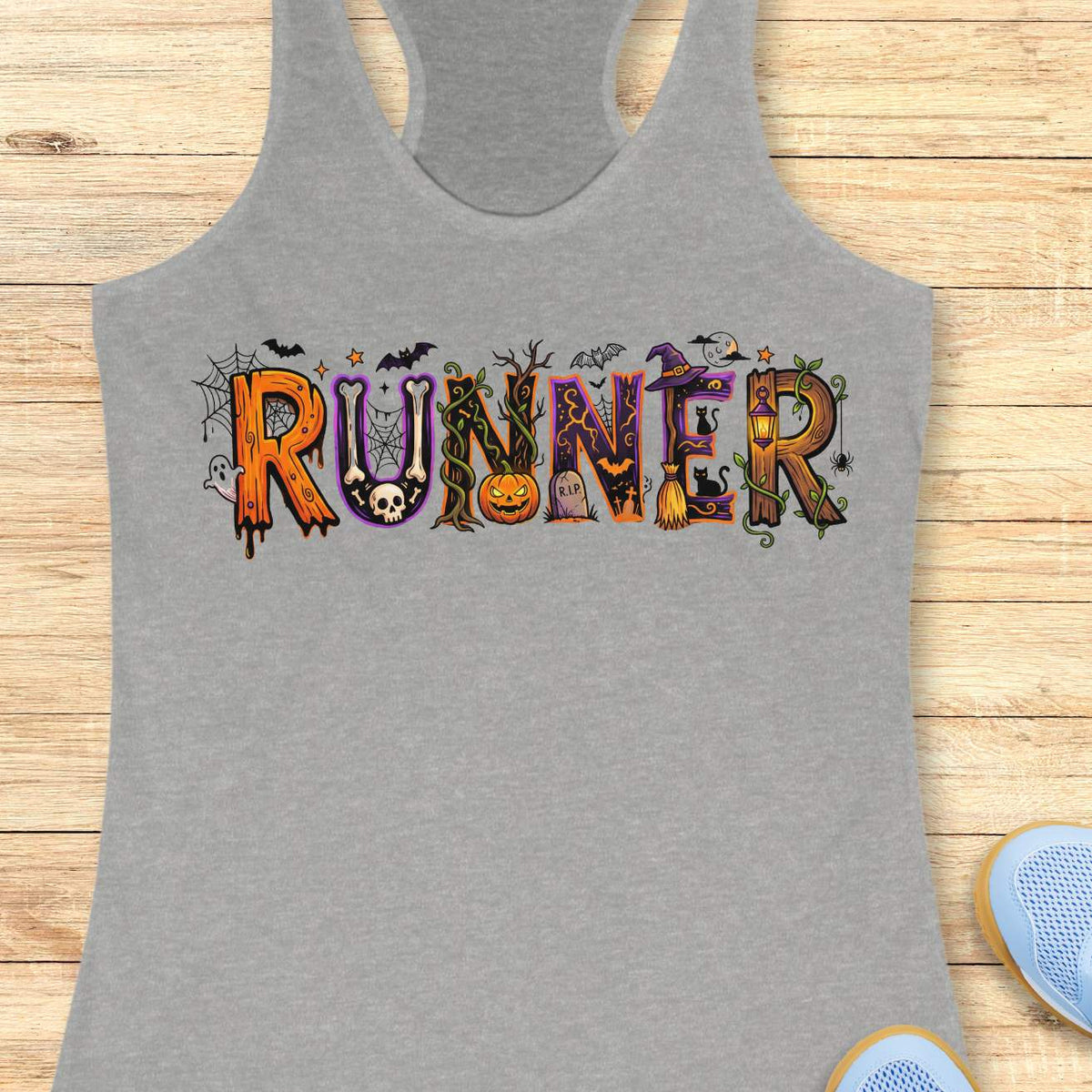 grey racerback tank top featuring the word “RUNNER” in large Halloween-themed decorative letters. Each letter is uniquely styled with spooky elements including spider webs, bats, a skull, twisting vines, a jack-o'-lantern, a gravestone marked “R.I.P.,” a witch’s hat, a broomstick, black cats, a lantern, a ghost, and a full moon. The colorful orange, purple, black, and green artwork creates a fun and festive Halloween design for runners who love spooky season.