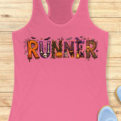 pink racerback tank top featuring the word “RUNNER” in large Halloween-themed decorative letters. Each letter is uniquely styled with spooky elements including spider webs, bats, a skull, twisting vines, a jack-o'-lantern, a gravestone marked “R.I.P.,” a witch’s hat, a broomstick, black cats, a lantern, a ghost, and a full moon. The colorful orange, purple, black, and green artwork creates a fun and festive Halloween design for runners who love spooky season.