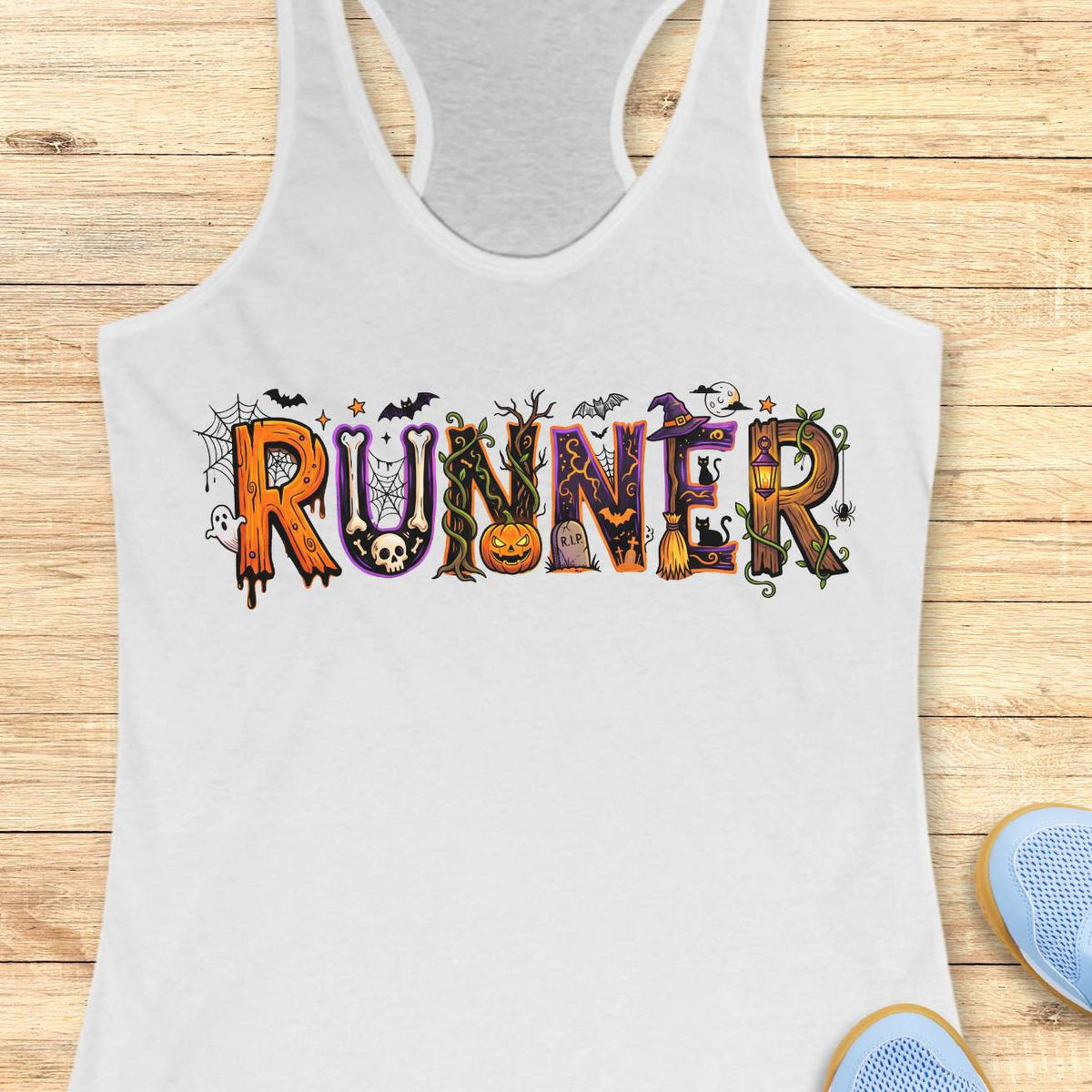 White racerback tank top featuring the word “RUNNER” in large Halloween-themed decorative letters. Each letter is uniquely styled with spooky elements including spider webs, bats, a skull, twisting vines, a jack-o'-lantern, a gravestone marked “R.I.P.,” a witch’s hat, a broomstick, black cats, a lantern, a ghost, and a full moon. The colorful orange, purple, black, and green artwork creates a fun and festive Halloween design for runners who love spooky season.