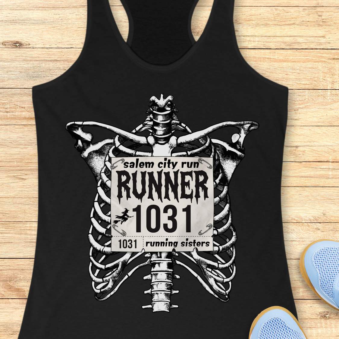Funny Halloween running tank top featuring a detailed black-and-white skeleton ribcage with a vintage race bib pinned across the chest. The bib reads “Salem City Run,” “RUNNER 1031,” and “1031 Running Sisters,” with spooky gothic typography and a small witch silhouette on a broomstick. The design is printed on a black racerback tank top and combines witchy Salem vibes, Halloween aesthetics, and women's running culture.