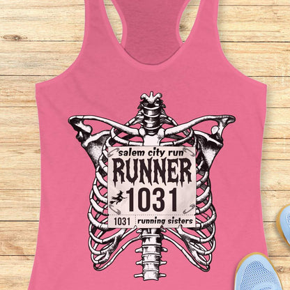 Funny Halloween running pink  tank top featuring a detailed black-and-white skeleton ribcage with a vintage race bib pinned across the chest. The bib reads “Salem City Run,” “RUNNER 1031,” and “1031 Running Sisters,” with spooky gothic typography and a small witch silhouette on a broomstick. The design is printed on a black racerback tank top and combines witchy Salem vibes, Halloween aesthetics, and women's running culture.