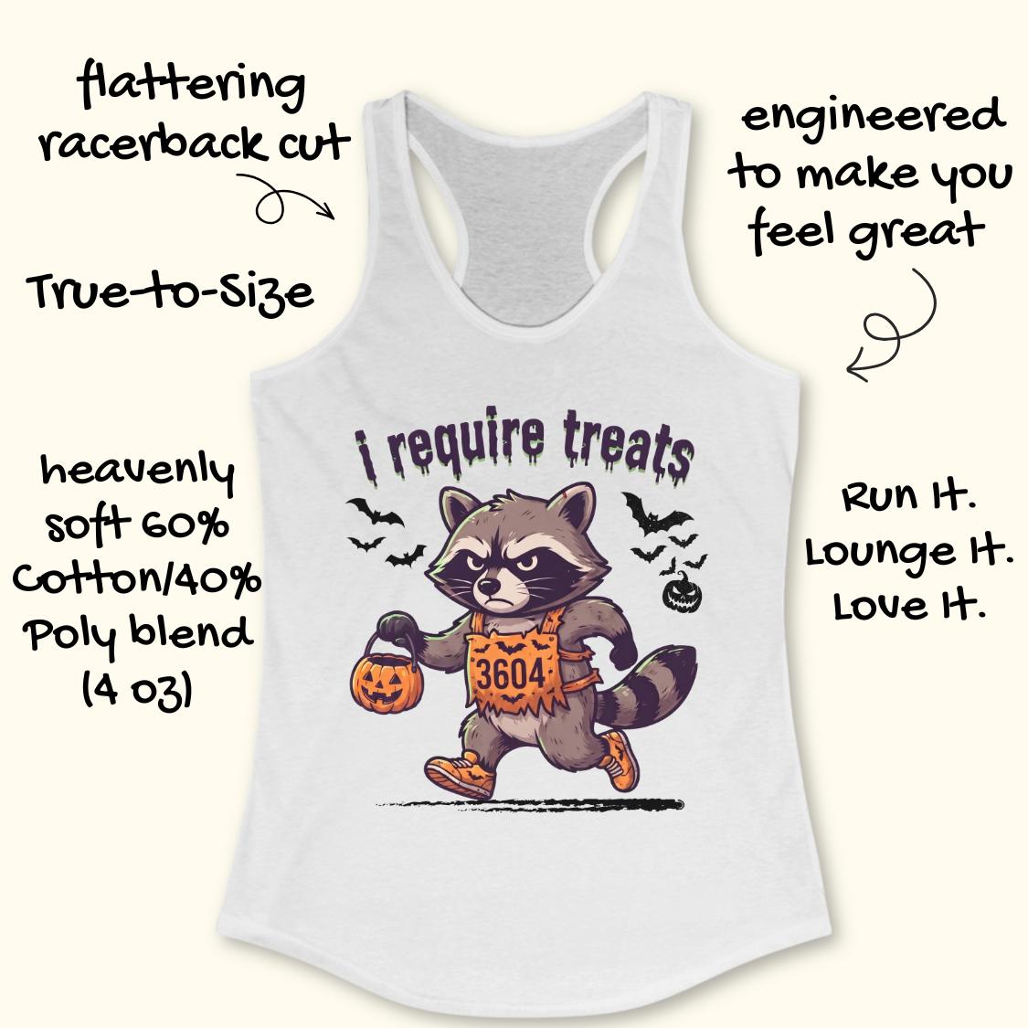 A racerback tank top shown on a light cream background with decorative text callouts around it. The tank is white and features a large front graphic of a raccoon in a Halloween costume holding a pumpkin, with the phrase 'i require treats' above it.