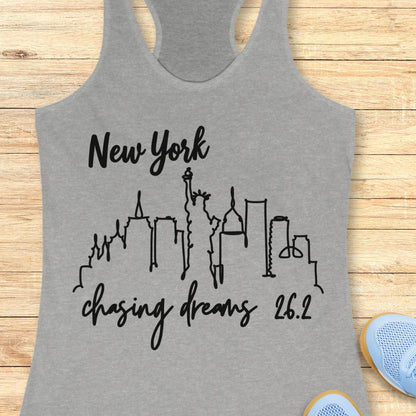 grey tank top with new york skyline and text - New York, chasing dreams 262., on a wooden background