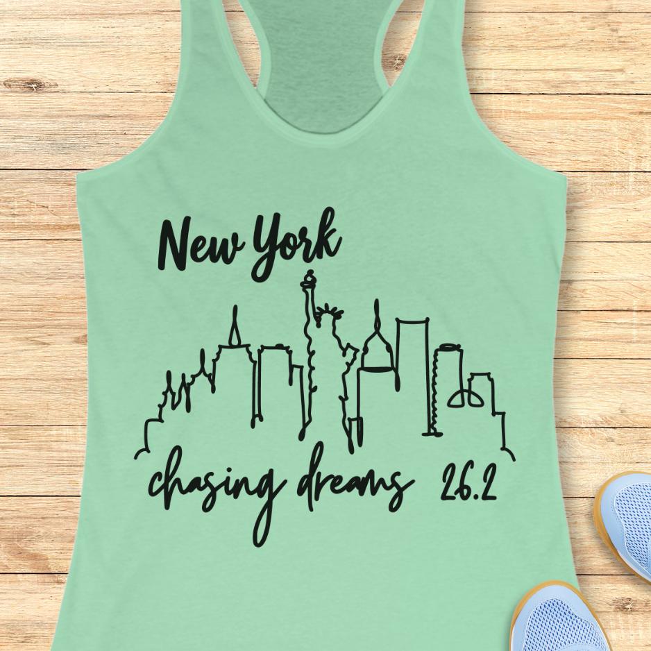 mint tank top with new york skyline and text - New York, chasing dreams 262., on a wooden background