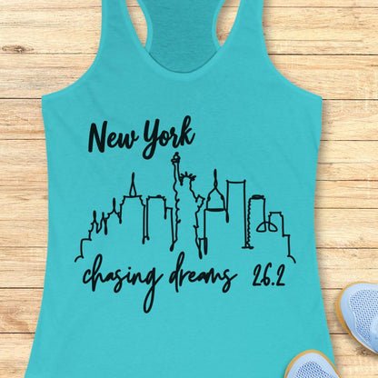 blue tank top with new york skyline and text - New York, chasing dreams 262., on a wooden background