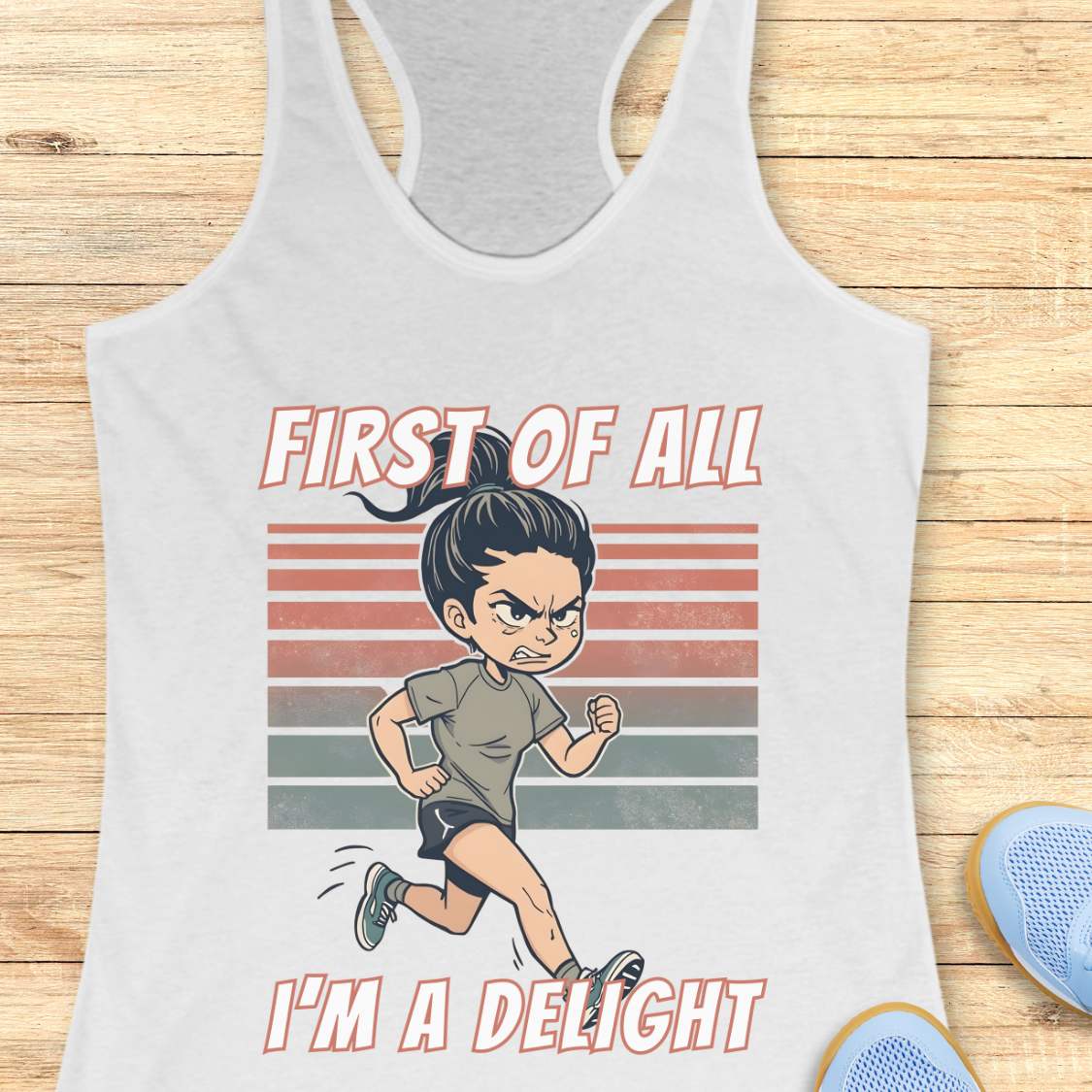 white Tank top with a graphic of a girl running and text 'First of all, I'm a delight' on a wooden surface.