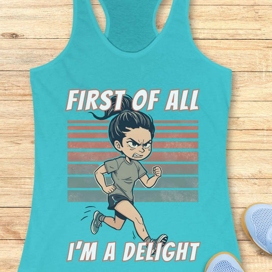 Turquoise tank top with a graphic of a running person and text first of all I'm a delight on a wooden surface