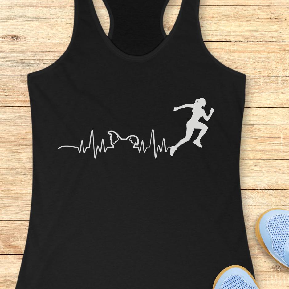 black tank top with an image of an electrocardiogram with dog ears and a woman runner silhouette, on a wooden background