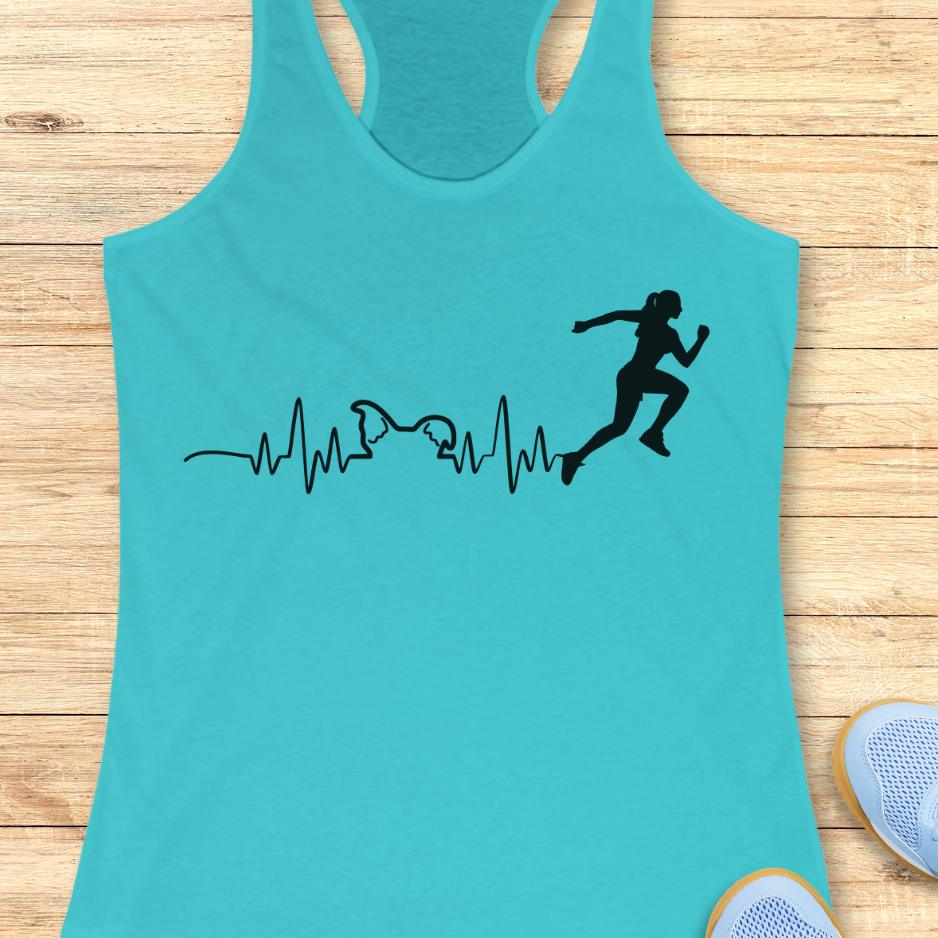 blue tank top with an image of an electrocardiogram with dog ears and a woman runner silhouette, on a wooden background