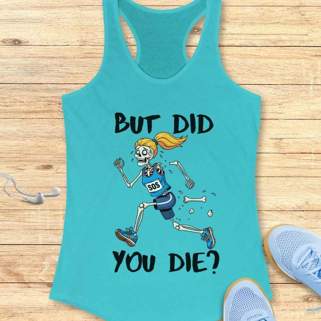 Product photo of a graphic teal tank top featuring a cartoon skeleton runner with a blonde ponytail and blue gear, an SOS bib, losing bones as it runs, accompanied by the bold text But Did You Die, displayed on a wooden surface with light blue running shoes and white earbuds nearby
