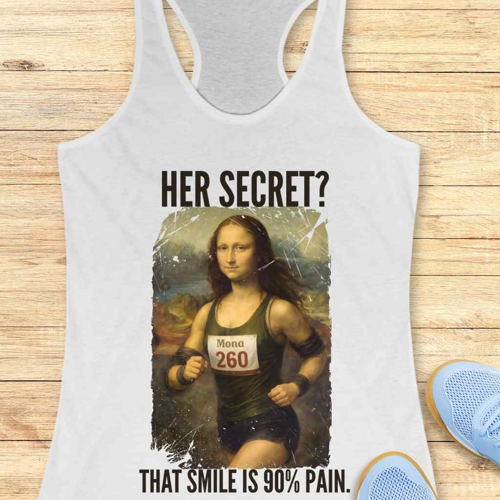 Graphic print on a white tank top featuring a humorous rendition of Leonardo da Vinci's Mona Lisa as a female runner wearing a green tank top, black shorts, and a Mona 260 race bib over her iconic sfumato landscape background, with the bold text HER SECRET? and THAT SMILE IS 90% PAIN