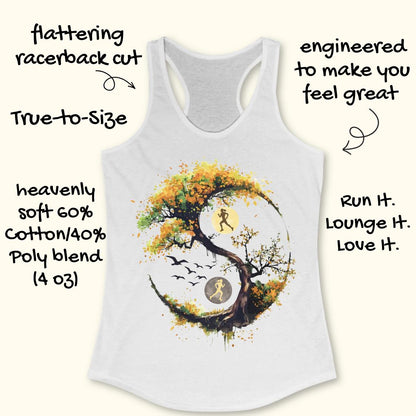 A white racerback tank top laid flat on a light wood surface, featuring a large graphic of a stylized tree with autumn leaves in yellow, orange, and brown, integrated with a running yin-yang symbol showing two running figures and birds.