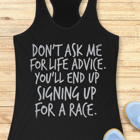 A black racerback tank top with white hand-drawn text reading 'DON'T ASK ME FOR LIFE ADVICE. YOU'LL END UP SIGNING UP FOR A RACE.