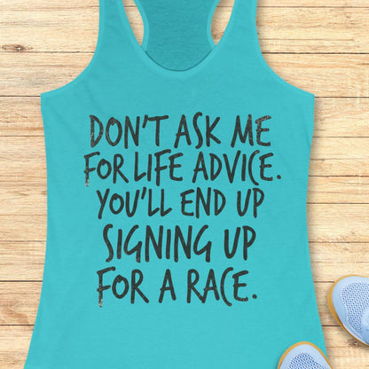A turquoise racerback tank top with black text reading 'DON'T ASK ME FOR LIFE ADVICE. YOU'LL END UP SIGNING UP FOR A RACE.