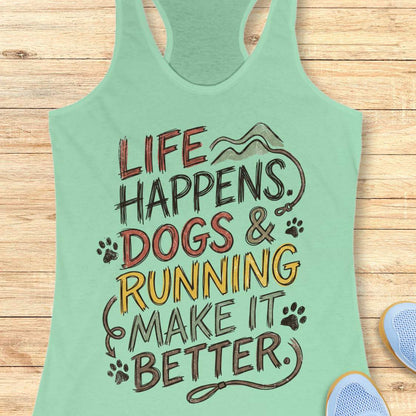 A mint green racerback tank top with a graphic print that reads 'LIFE HAPPENS. DOGS & RUNNING MAKE IT BETTER.