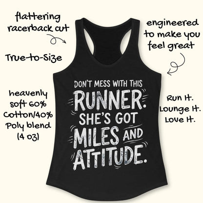 A black racerback tank top with a white distressed text graphic reading 'DON'T MESS WITH THIS RUNNER. SHE'S GOT MILES AND ATTITUDE.