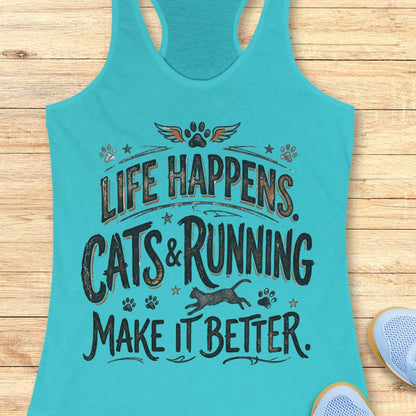 A turquoise racerback tank top laid flat on a light wood surface, featuring a distressed graphic that reads 'LIFE HAPPENS. CATS & RUNNING MAKE IT BETTER.