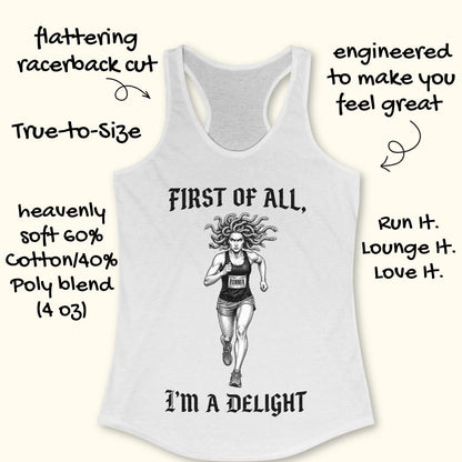 white women's racerback running tank top displayed on a light wood surface. The design features a black-and-white illustration of a runner with Medusa-style snake hair wearing a race bib. Above the runner, gothic-style text reads “FIRST OF ALL,” and below the runner, matching text reads “I’M A DELIGHT.” Running shoes are partially visible in the corners of the image.