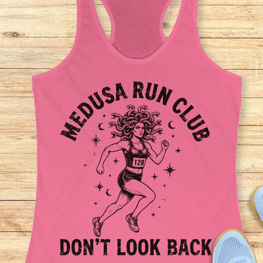 Pink women's running tank top featuring a Medusa runner with snake hair, race bib 128, stars, and moons. Text reads "MEDUSA RUN CLUB" and "DON'T LOOK BACK." Mythology-inspired running apparel for women runners, featuring an empowering Greek mythology fitness design.
