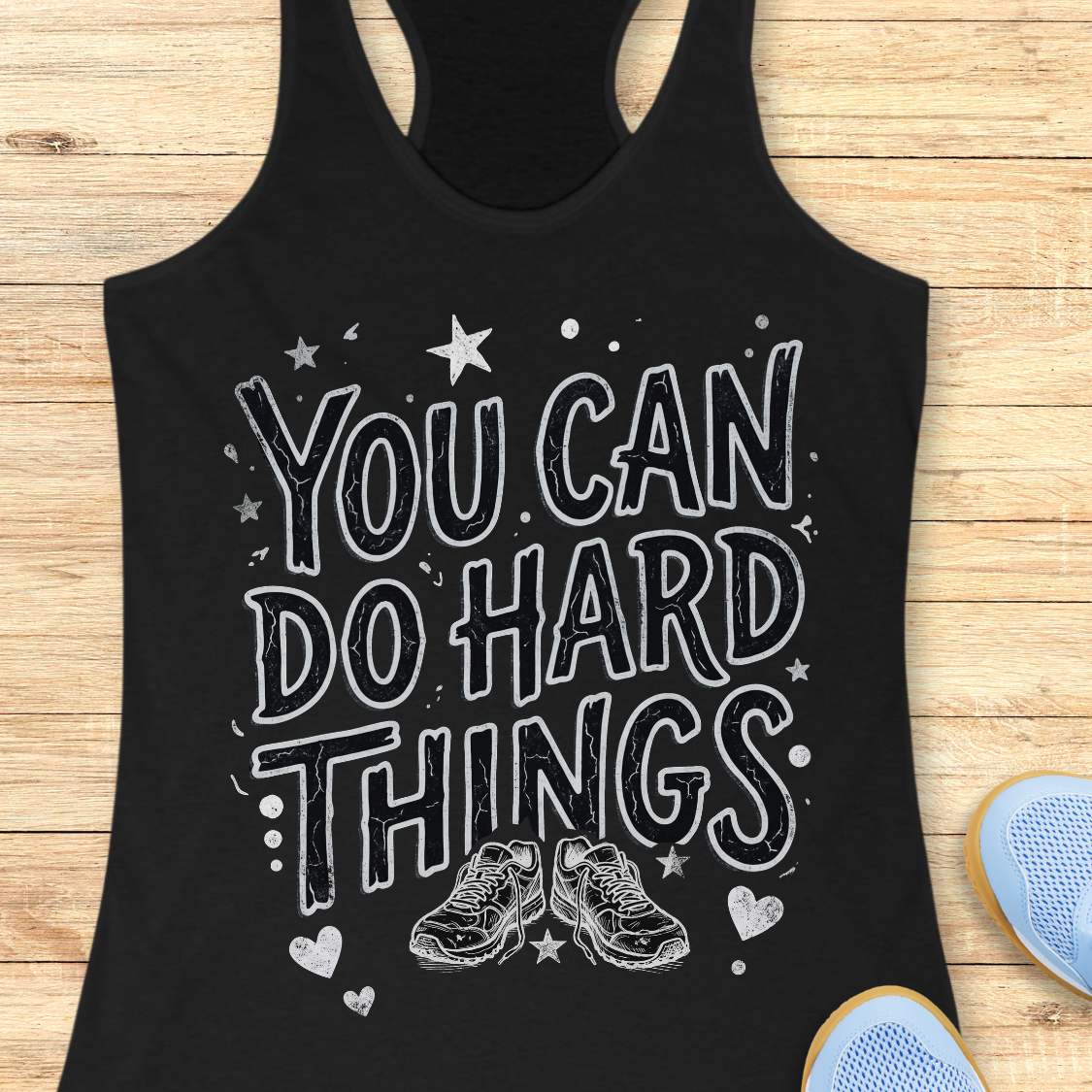 Motivational running black racebak tank top featuring the quote “You Can Do Hard Things” with running shoes, stars, and hearts on a black women's racerback tank, inspirational gift for runners, marathon runners, and fitness lovers.