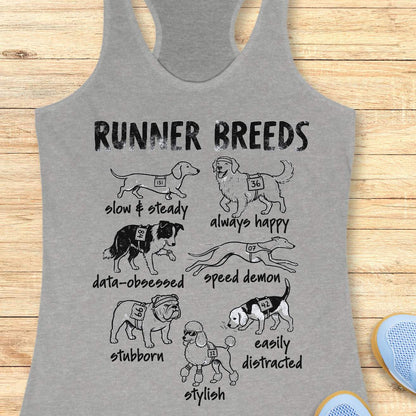Funny Runner Breeds grey tank top featuring dog breed runner personalities including Slow & Steady Dachshund, Always Happy Golden Retriever, Data-Obsessed Border Collie, Speed Demon Greyhound, Stubborn Bulldog, Easily Distracted Beagle, and Stylish Poodle. Humorous running apparel for women runners, marathon runners, half marathon participants, dog lovers, race enthusiasts, and fitness fans. Graphic running tank with race bib dogs and runner humor illustration.