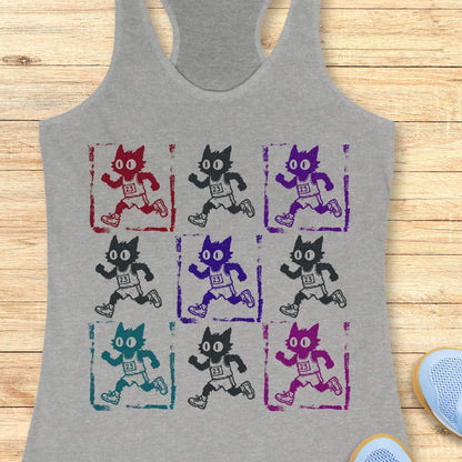 Heather gray women's racerback tank top with a retro pop-art running cat design. The graphic features a 3x3 grid of scruffy cartoon cats sprinting in race gear, each wearing a race bib marked 23. Rendered in a distressed screen-print style with vintage textures and colorful variations in red, purple, teal, magenta, and black, the artwork combines running culture, cat lover humor, and indie cartoon aesthetics. This unique running tank is ideal for women runners, marathoners, joggers, trail runners, race day 