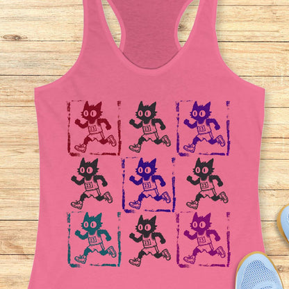 pink women's racerback tank top with a retro pop-art running cat design. The graphic features a 3x3 grid of scruffy cartoon cats sprinting in race gear, each wearing a race bib marked 23. Rendered in a distressed screen-print style with vintage textures and colorful variations in red, purple, teal, magenta, and black, the artwork combines running culture, cat lover humor, and indie cartoon aesthetics. This unique running tank is ideal for women runners, marathoners, joggers, trail runners, 