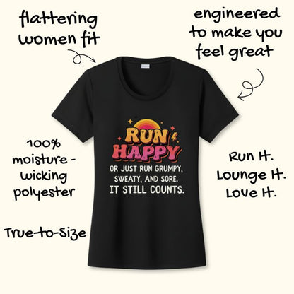 Black women's short-sleeve t-shirt featuring a colorful 'RUN HAPPY' graphic with an orange sun and yellow lightning bolts above the slogan 'OR JUST RUN GRUMPY, SWEATY, AND SORE. IT STILL COUNTS' promoting a flattering fit and moisture-wicking polyester