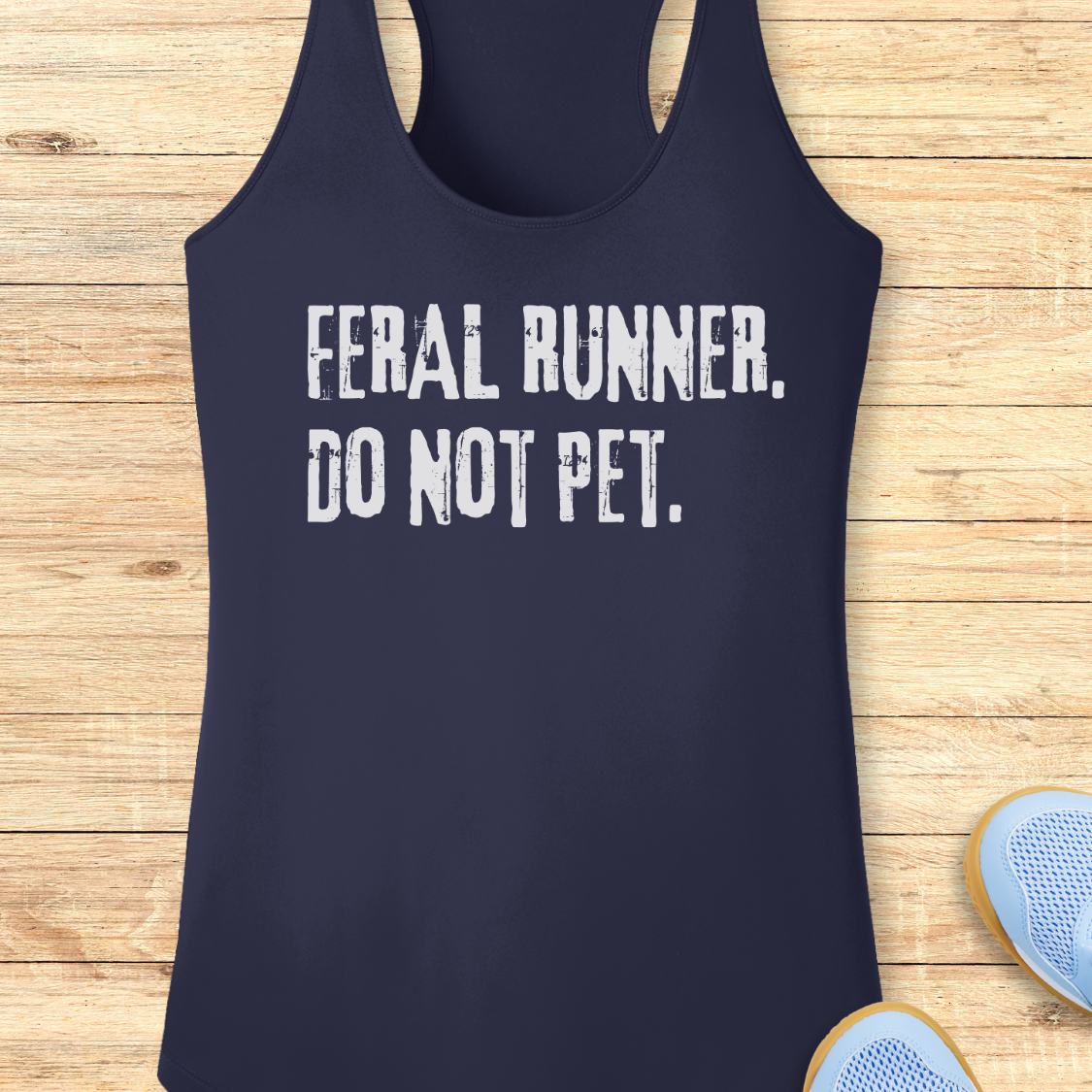 A navy blue racerback performance  tank top with the text 'FERAL RUNNER. DO NOT PET.