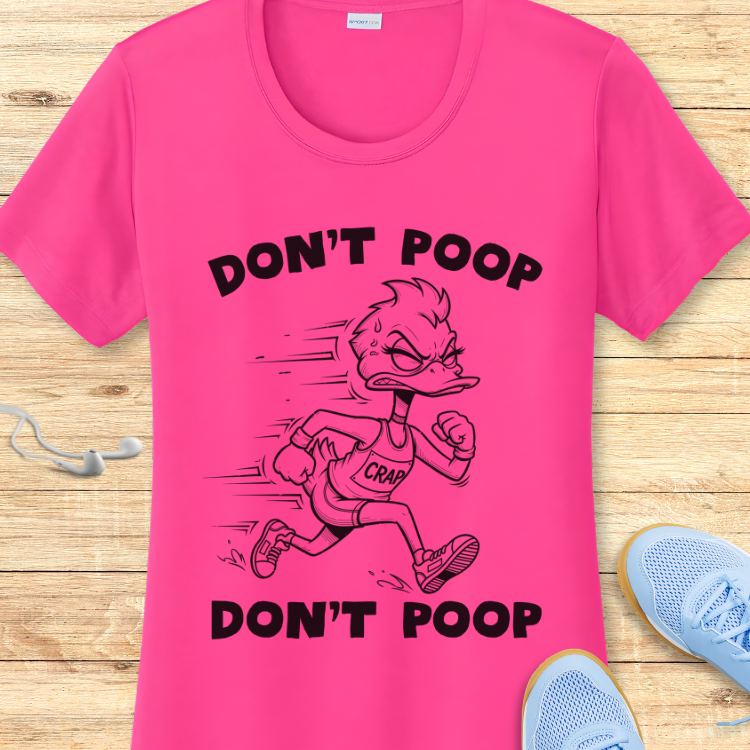 A hot pink t-shirt with a black line art cartoon of an angry running duck wearing a "CRAP" tank top and the repeated text "DON'T POOP" on a light wooden background, with light blue running shoes and white earbuds visible