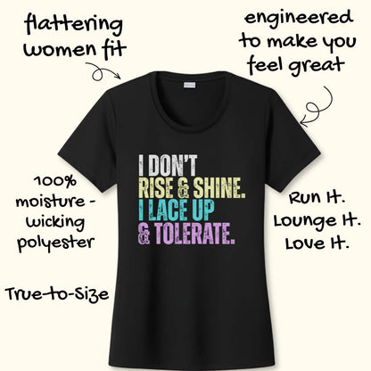 Black t-shirt with colorful text 'I DON'T RISE & SHINE. I LACE UP & TOLERATE.'  on a white background