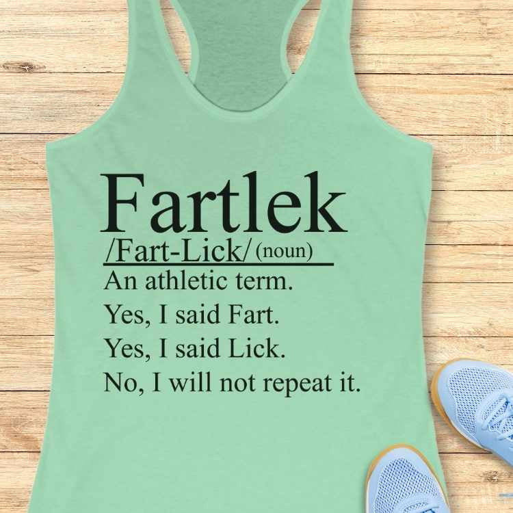 Light mint green racerback tank top with black text humorously defining "Fartlek" as an athletic term involving "Fart" and "Lick" displayed on a pale wooden background next to light blue mesh running shoes