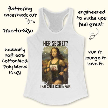 White women's racerback tank top featuring a print of a Mona Lisa parody depicting her as a runner with a 'Mona 260' bib and text 'HER SECRET? THAT SMILE IS 90% PAIN' alongside descriptive product details like 'flattering racerback cut' and 'heavenly soft 60% Cotton/40% Poly blend'