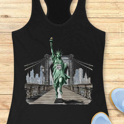 Graphic print of the Statue of Liberty running with a "RUN NY" race bib across the Brooklyn Bridge, torch held aloft, against a grey-blue New York City skyline
