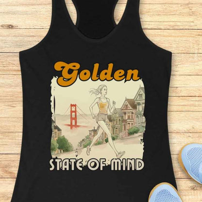 Graphic design on a black tank top showing a blonde woman in yellow top and grey shorts jogging past San Francisco's colorful Painted Ladies with the red Golden Gate Bridge in the background and "Golden State of Mind" text