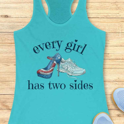 Turquoise tank top with high-heeled shoe and sneakers graphic and text on a wooden surface